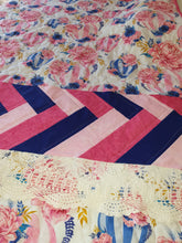 Load image into Gallery viewer, Bespoke Cot quilt, herringbone pattern, vintage crochet and hot air baollons.